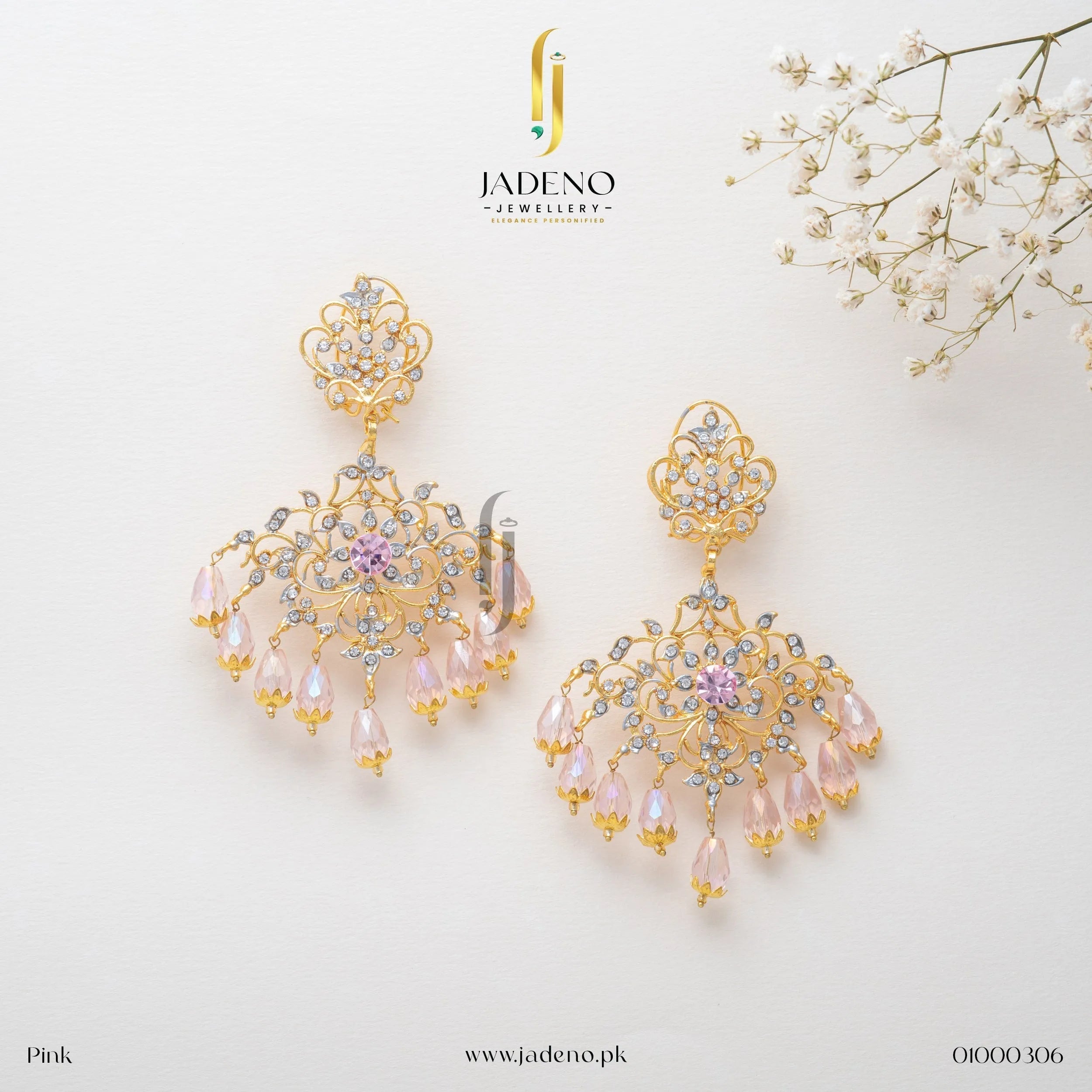 Stunning Sunflower Earrings in pink with ruby center stone and pista drop beads. Perfect for weddings and festive occasions. Available at JADENO.