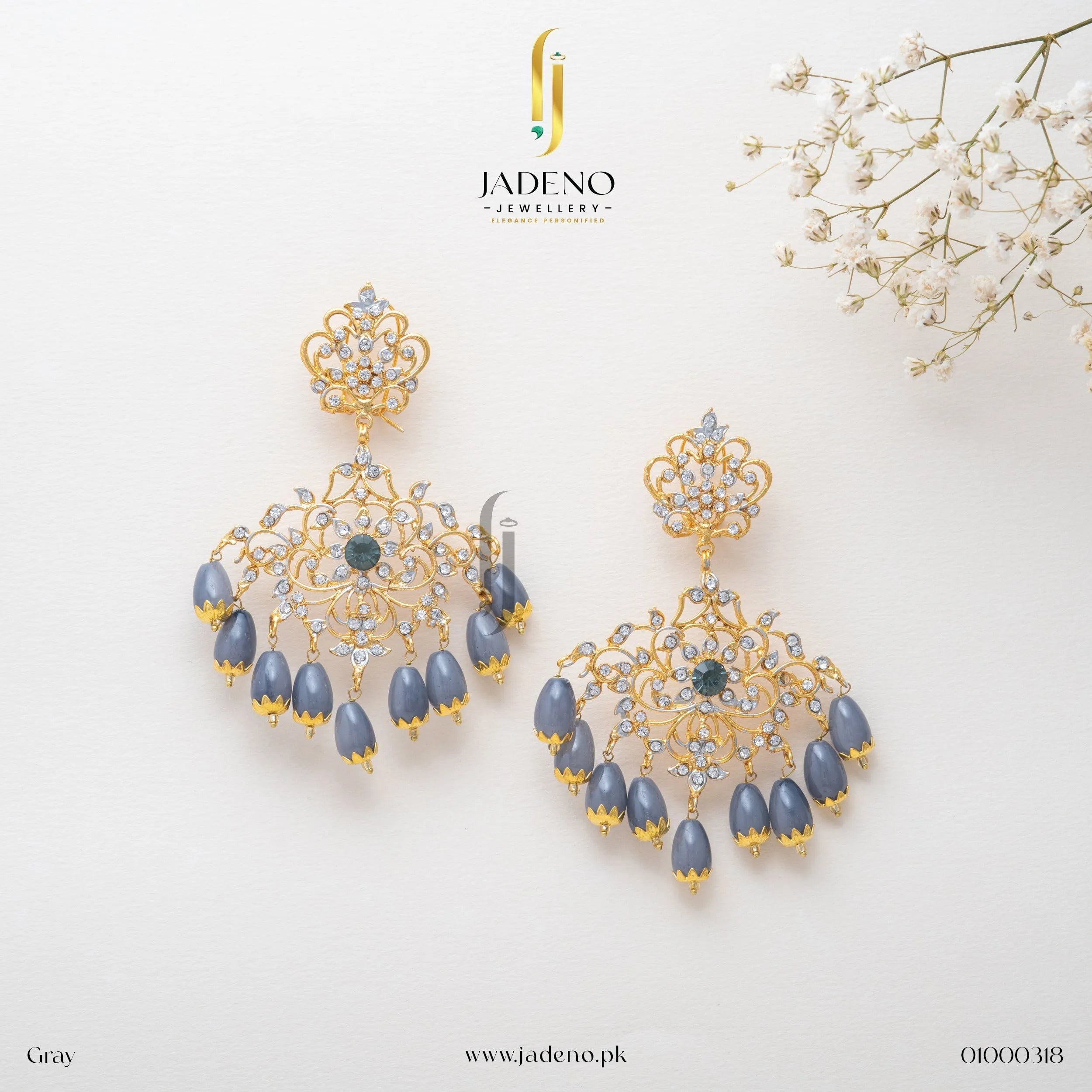 Stunning Sunflower Earrings in gray with ruby center stone and pista drop beads. Perfect for weddings and festive occasions. Available at JADENO.