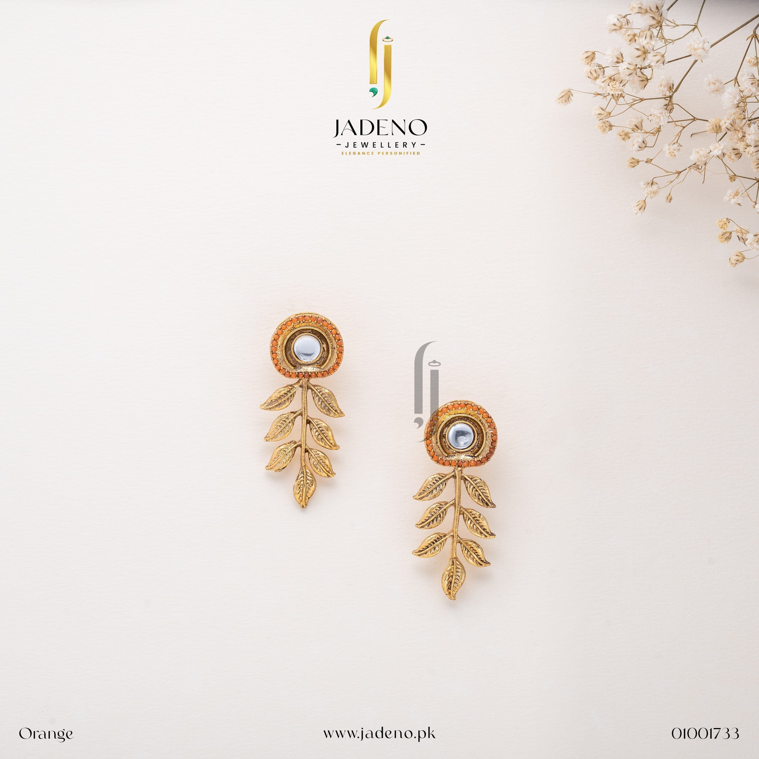"Orange Resplendent Egyptian Leaf Earring Studs with golden leaves and a central stone. Perfect for formal and festive occasions. Available at JADENO"