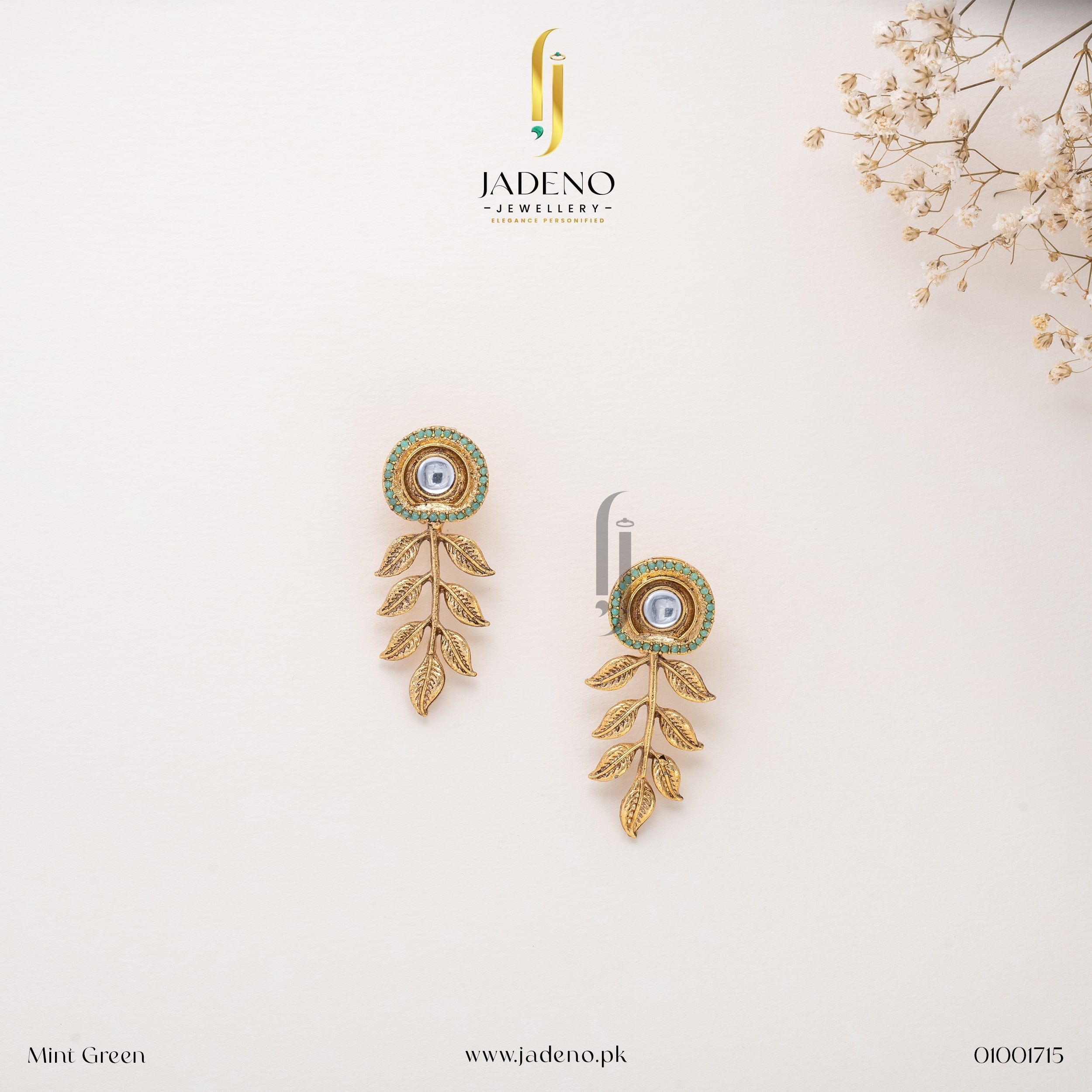 "Elegant Mint Green Resplendent Egyptian Leaf Earring Studs with intricate leaf detailing and a central stone, perfect for formal and festive occasions. Available at JADENO"