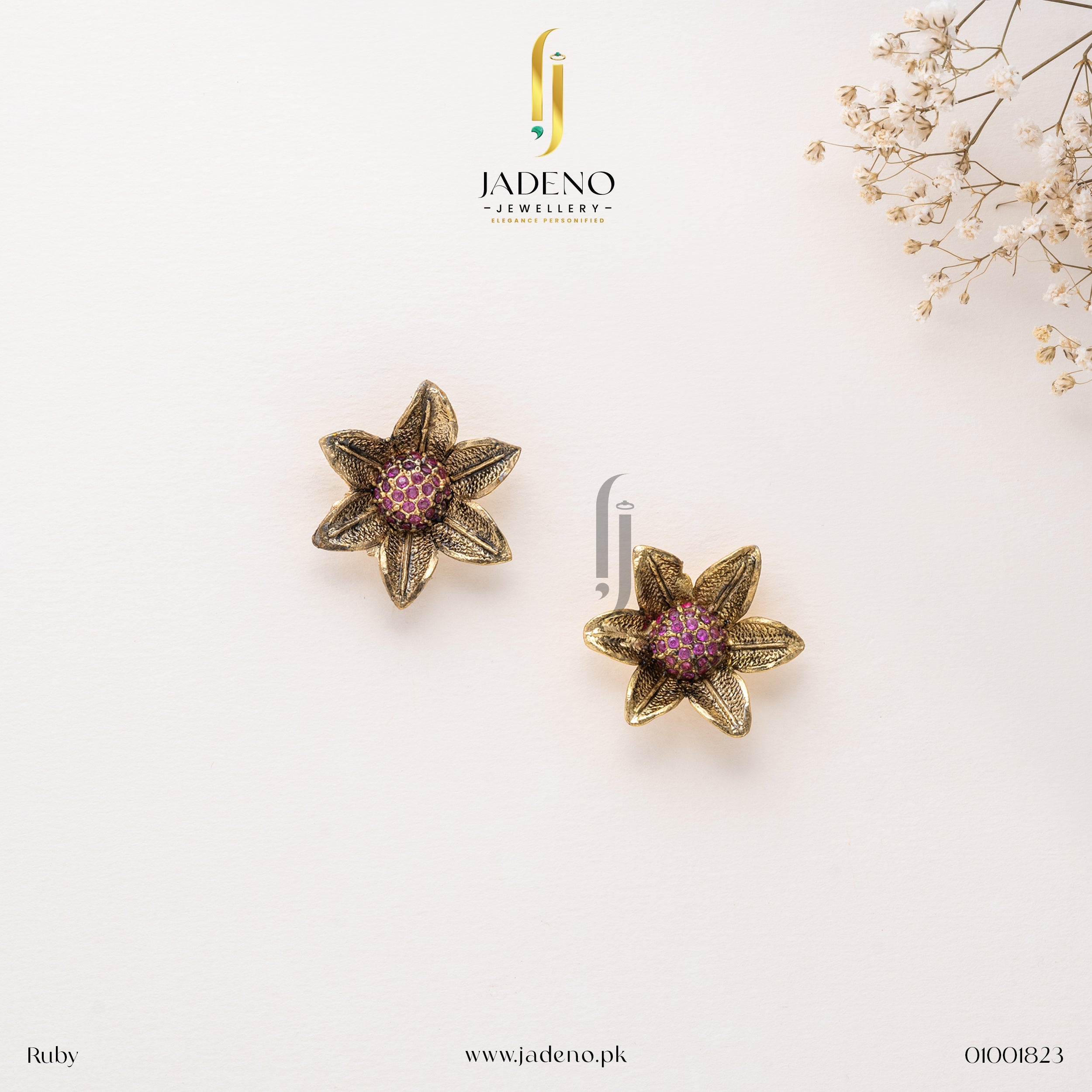 "Elegant flower-shaped Ruby stud earrings with intricate golden petals and a center of sparkling pink gemstones. Perfect for formal occasions. Available at JADENO"