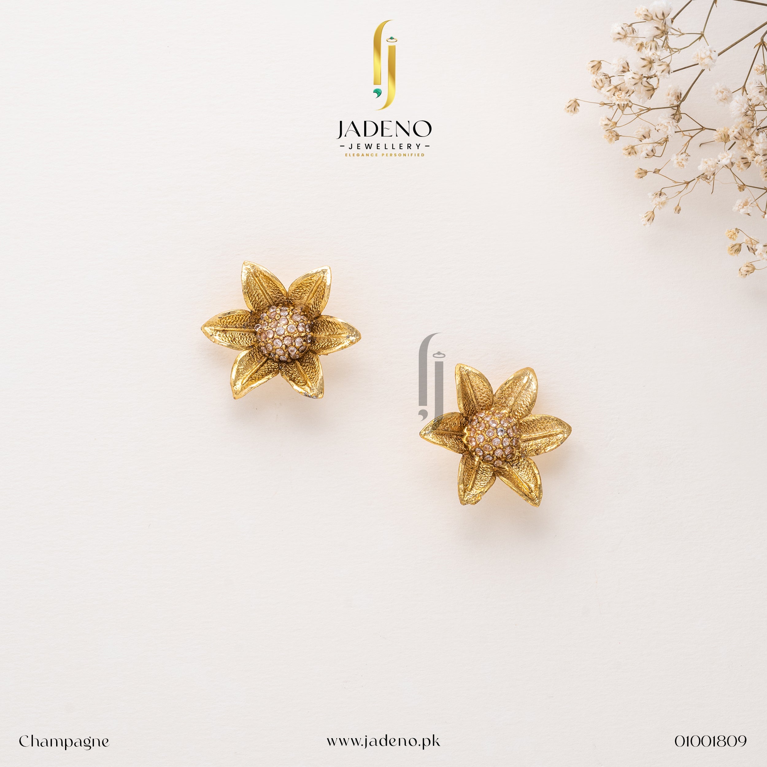 "Elegant Champagne flower-shaped stud earrings with golden petals and sparkling gemstone center. Perfect for formal and festive occasions. Available at JADENO"