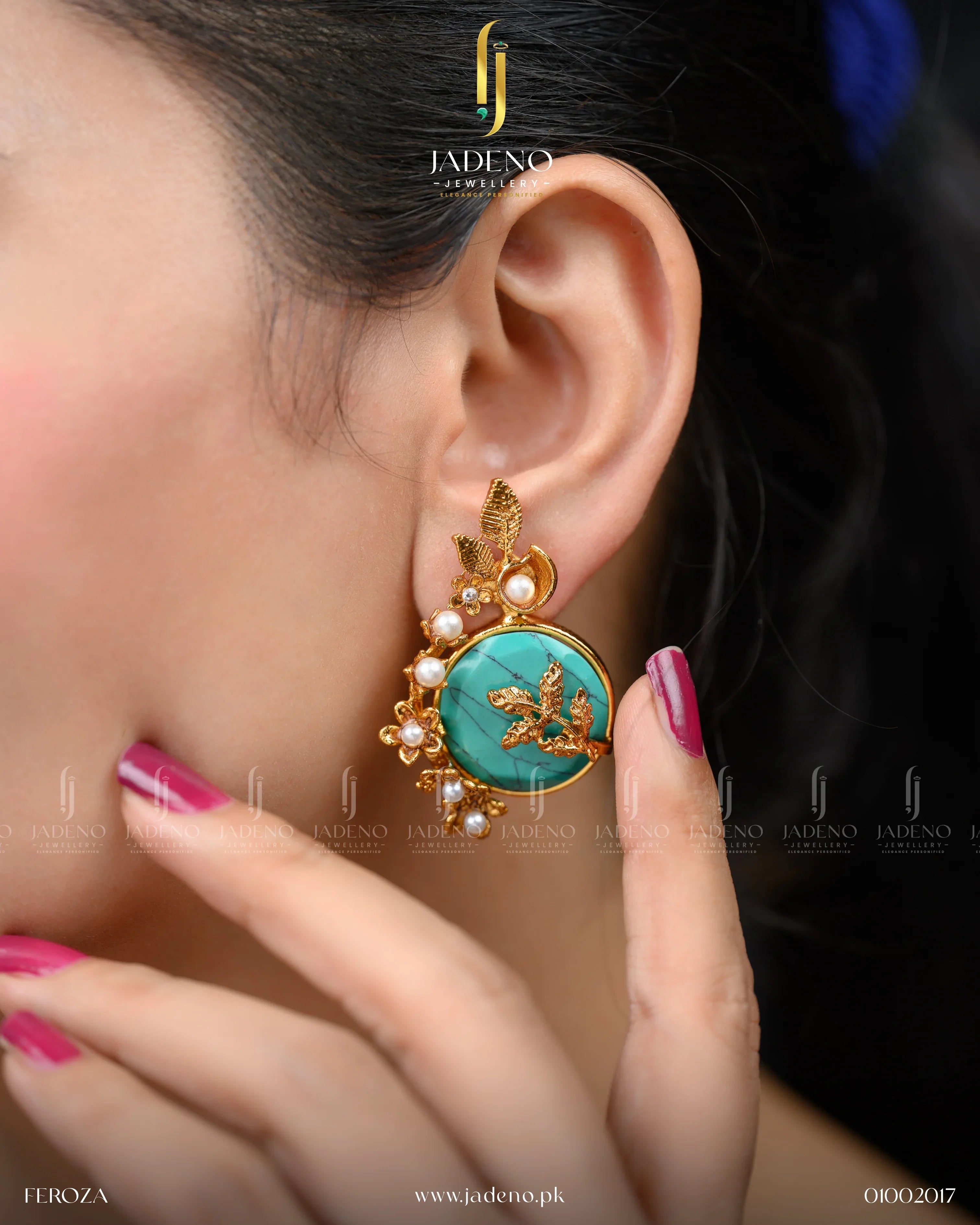 "Artificial gold earrings with turquoise stone and pearls worn on ear"