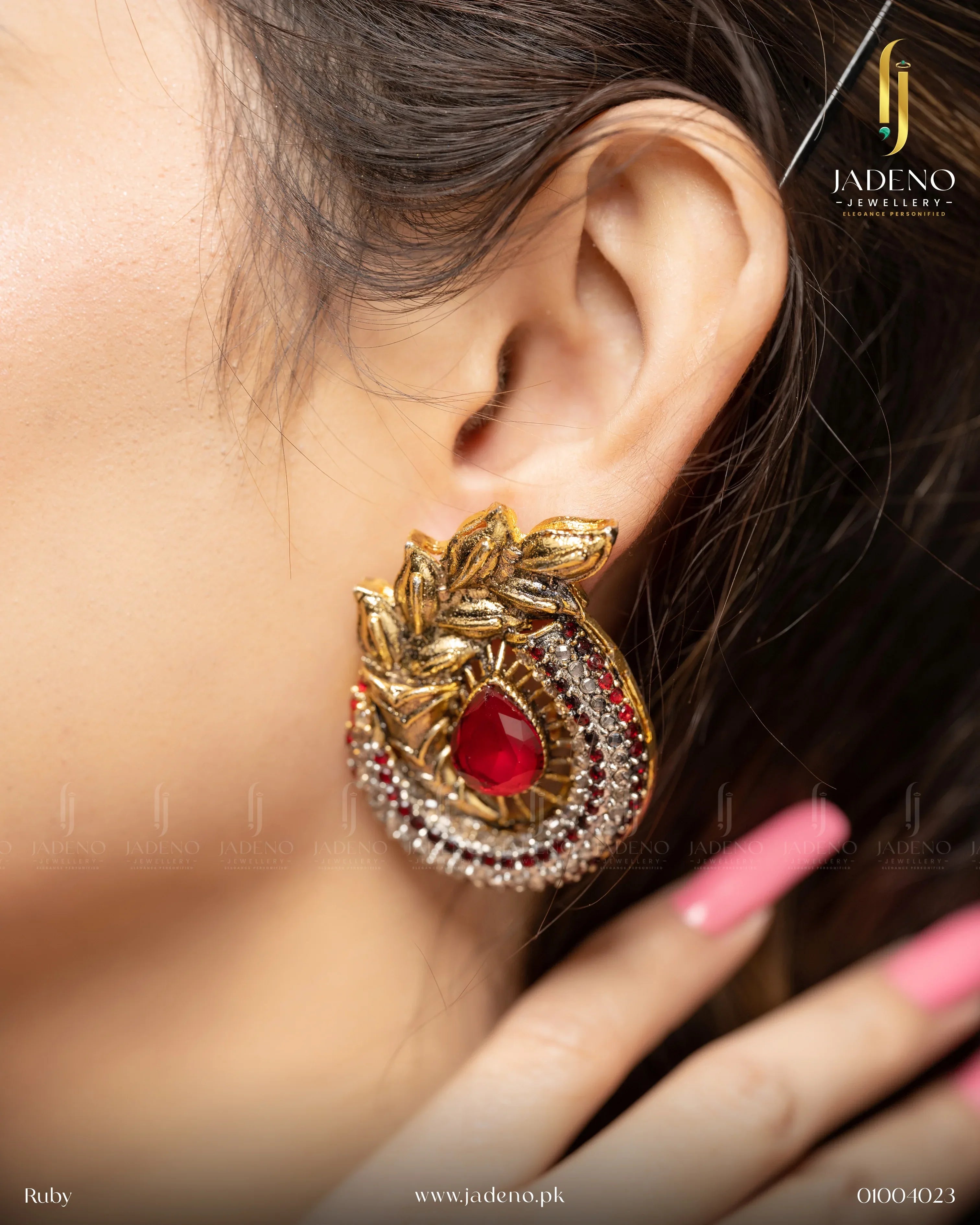 "Elegant ruby-colored Ancient Leaf earrings with gold detailing and sparkling gemstones, perfect for formal events. Available at JADENO"