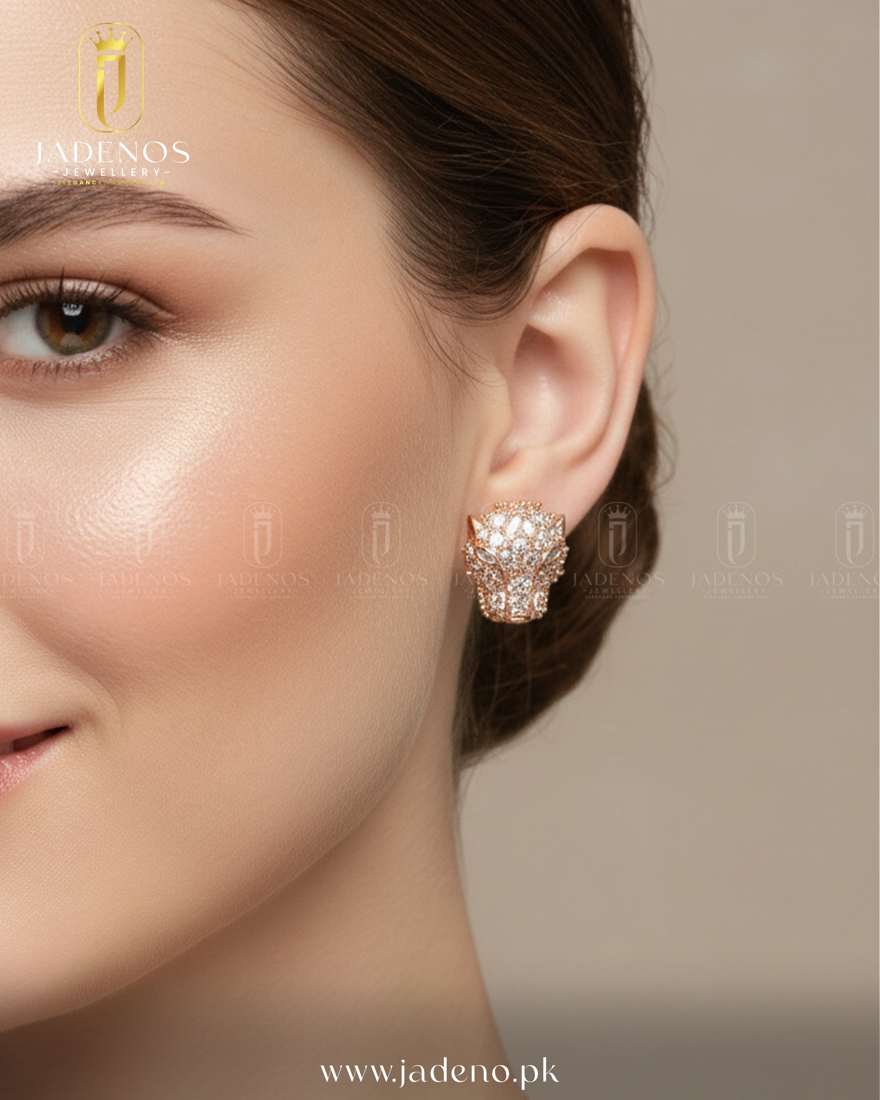 Close-up side view of model wearing The Imperial Lioness Pendant Set earrings, gold lion design with sparkling stone details