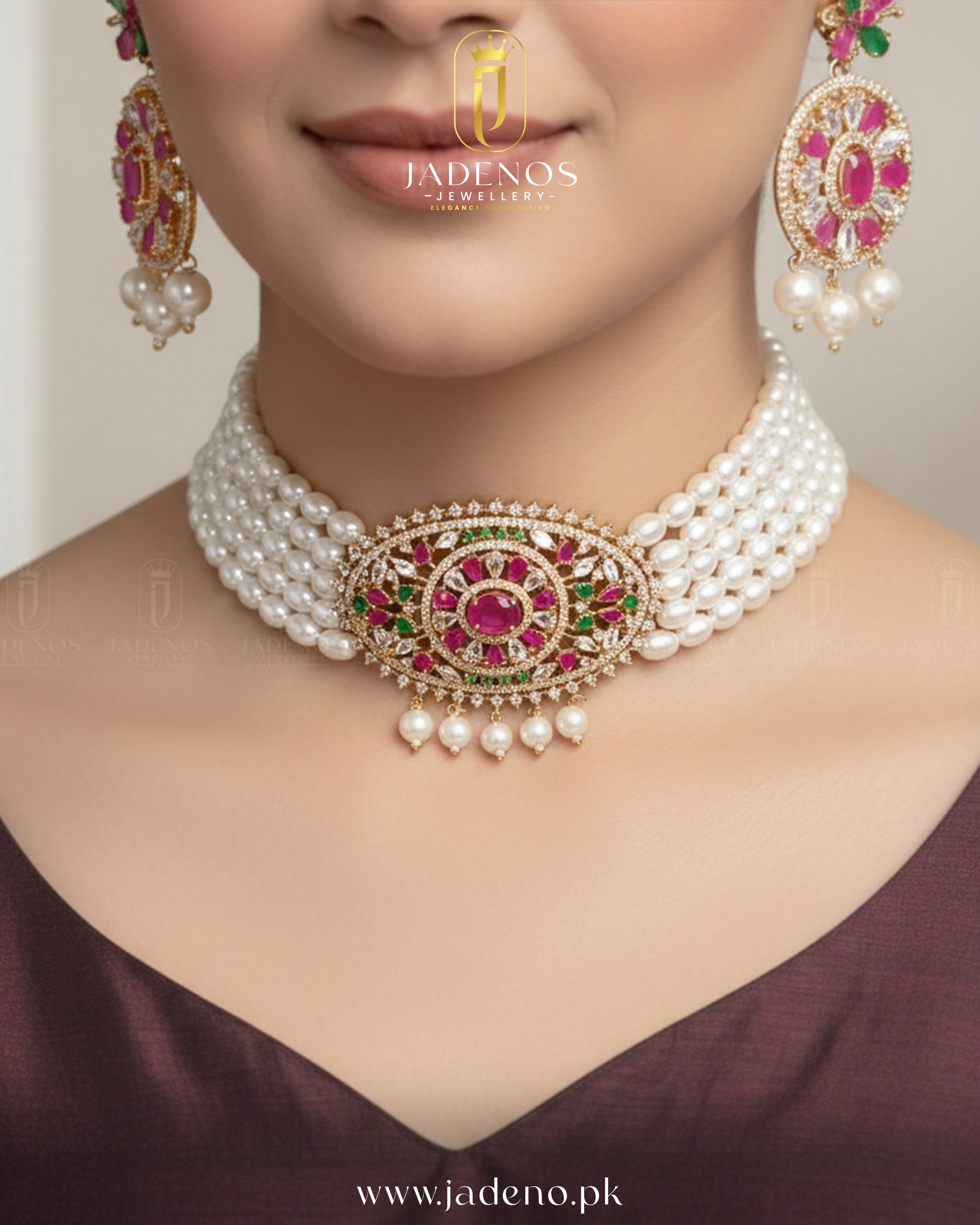Woman wearing Royal Maharani Pearl Choker Set with white pearls, pink ruby center, and green gemstone accents.