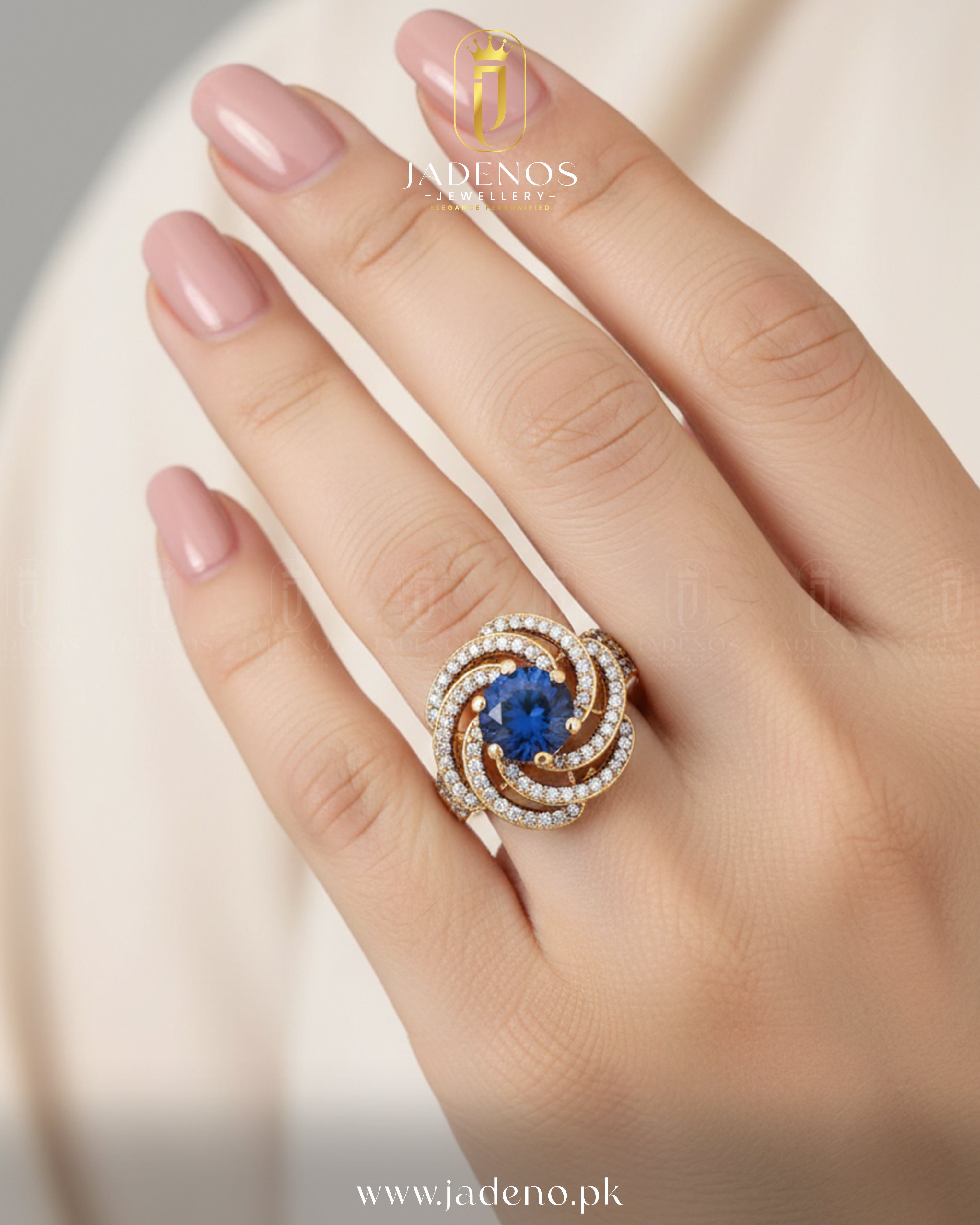 A vibrant blue Zirca Aurex Openable Ring is displayed on a finger, featuring a luxurious gold-tone spiral design set with zircons.